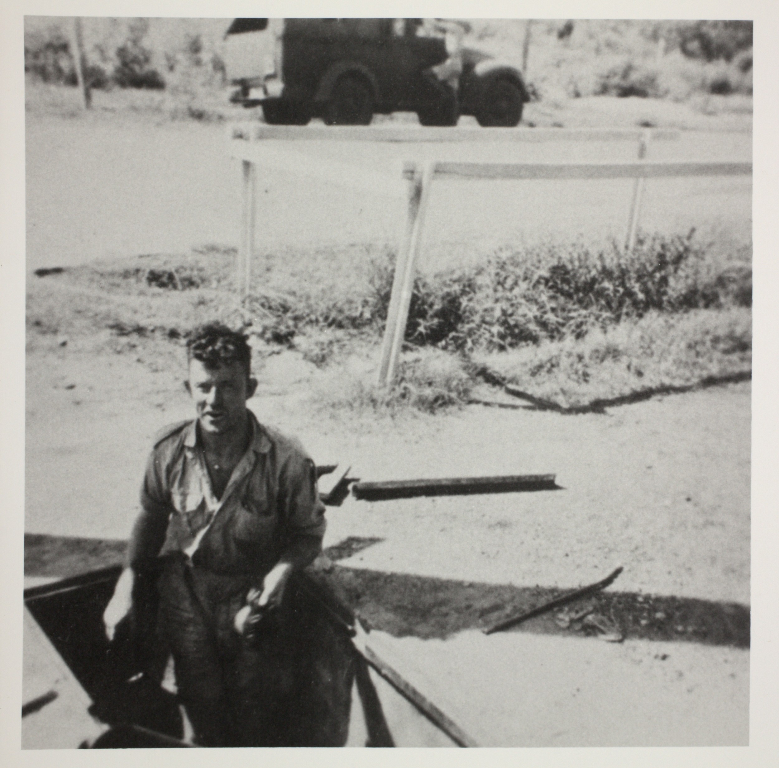 Herb Page in a Manhole at the corner of Daly and Mitchell Streets